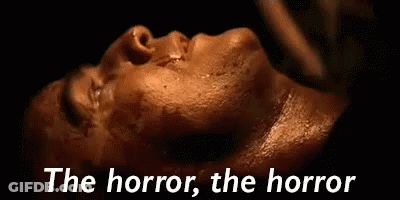 Close Up Face Saying The Horror The Horror GIF