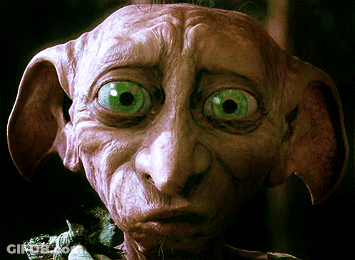 Close Up Face With Big Green Eyes GIF