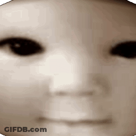 Close Up Face With Black Eyes And Smile GIF