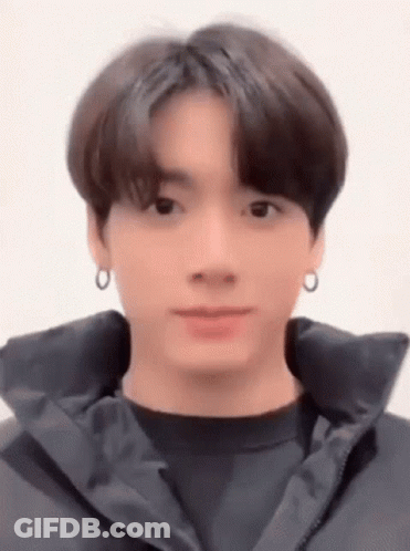 Close Up Face With Black Jacket And Earrings GIF