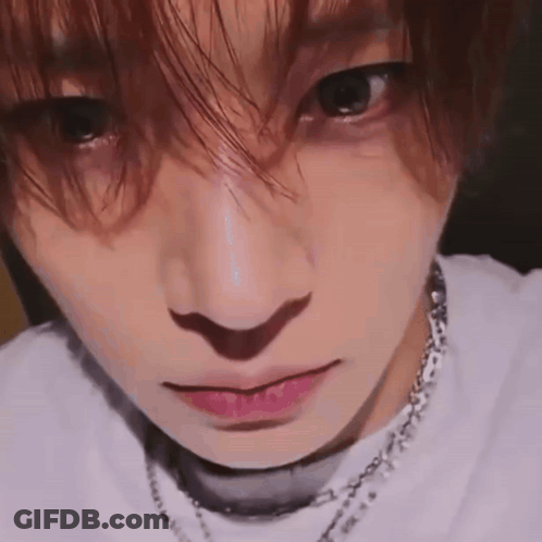 Close Up Face With Choker Necklace GIF