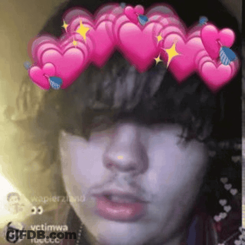 Close Up Face With Crown Of Pink Hearts GIF