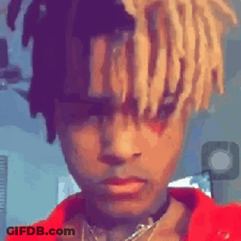 Close Up Face With Dreadlocks GIF