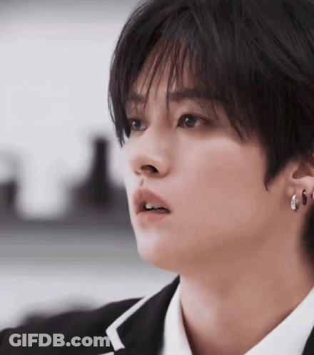 Close Up Face With Earrings GIF