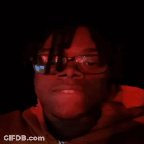 Close Up Face With Glasses And Dreadlocks GIF