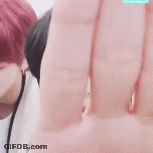 Close Up Face With Hands Around It GIF