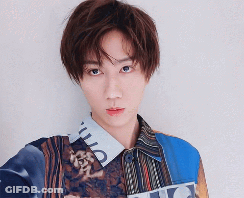 Close Up Face With Letter A Shirt GIF