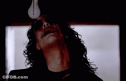 Close Up Face With Light Bulb On Head GIF