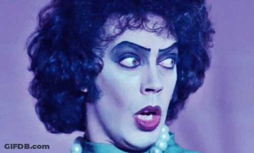 Close Up Face With Makeup And Pearls GIF