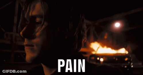 Close Up Face With Pain Written Below GIF