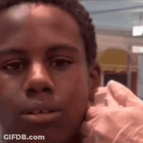 Close Up Face With Pink Glove GIF