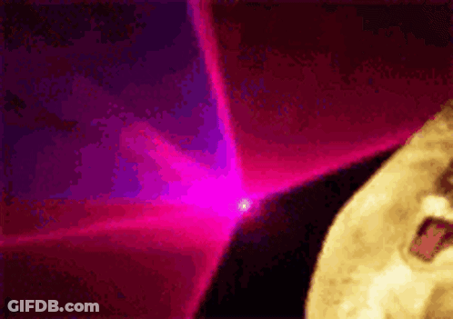 Close Up Face With Pink Light GIF