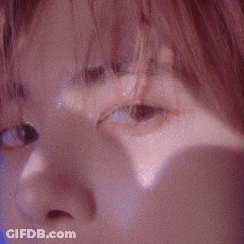 Close Up Face With Purple Background GIF