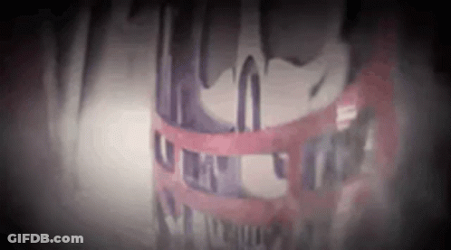 Close Up Face With Red And White Ribbon GIF