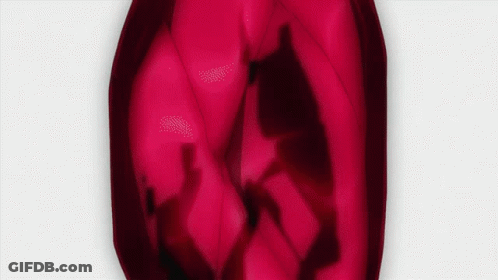 Close Up Face With Red Background GIF