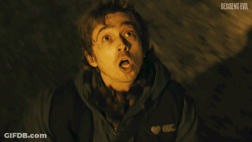 Close Up Face With Resident Evil Text GIF