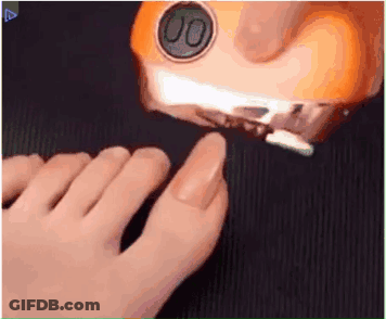Close Up Feet With Nail Clipper GIF
