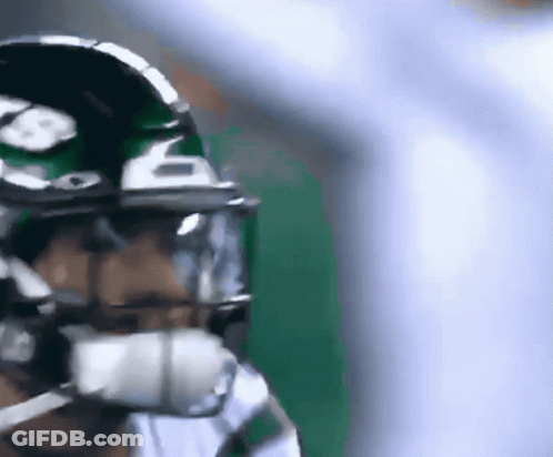 Close-Up Football Player Helmet Number 6 GIF