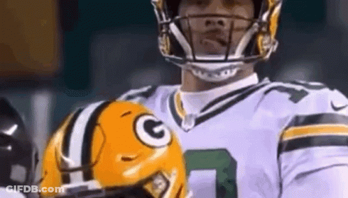Close Up Football Player Holding Helmet GIF