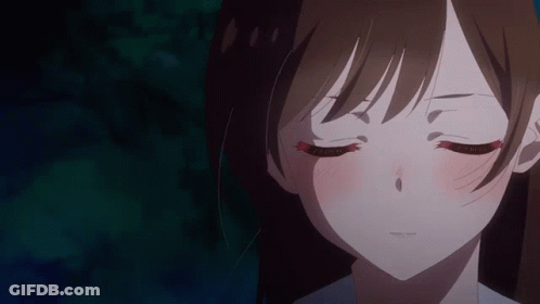 Close Up Girl Face With Red Eyelashes GIF
