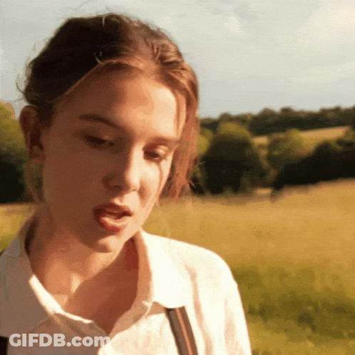 Close Up Girl In White Shirt And Vest GIF