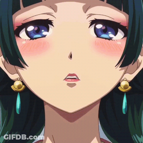 Close-Up Girl With Blue Eyes And Earrings GIF