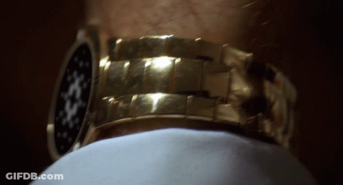 Close Up Gold Watch On Man's Arm GIF