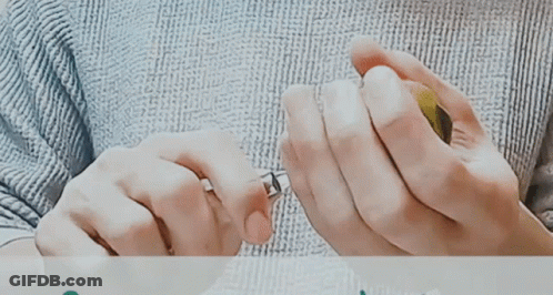 Close-Up Hands Holding Glass GIF