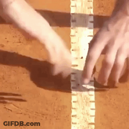 Close Up Hands Holding Piece Of Wood GIF