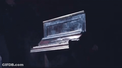 Close Up Machine Cutting Metal With Smoke GIF