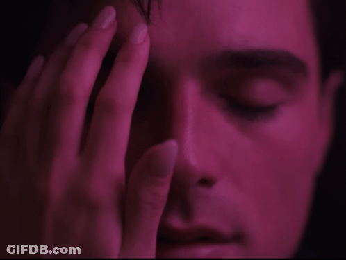 Close Up Man Eyes Closed Hand On Forehead GIF