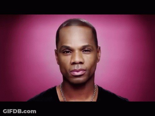 Close Up Man Face Against Pink Background GIF