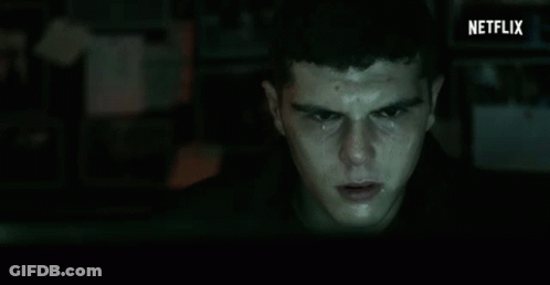 Close Up Man Face Dark Room Netflix Logo GIF