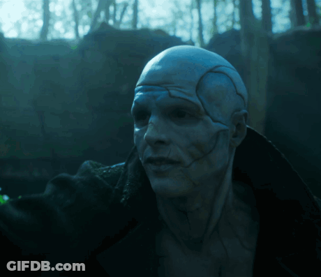 Close Up Man Face In Dark Forest GIF