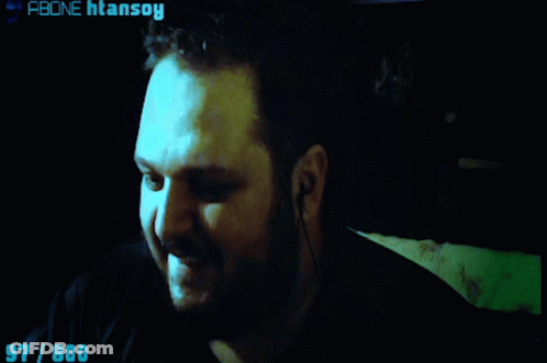 Close Up Man Face In Dark Room GIF