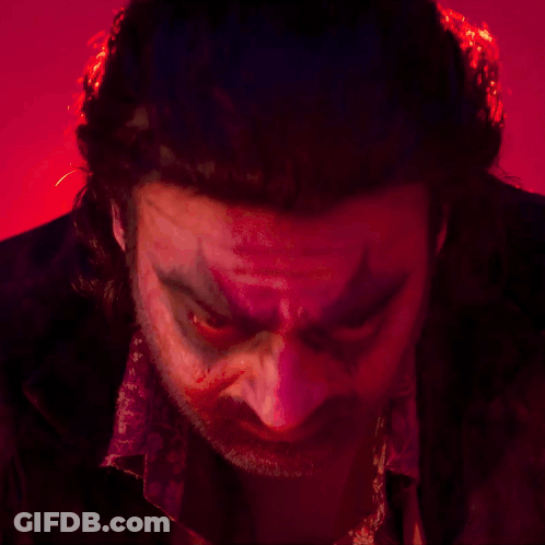 Close-Up Man Face Red Background GIF