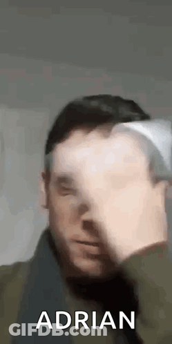 Close Up Man Face Saying Adrian GIF