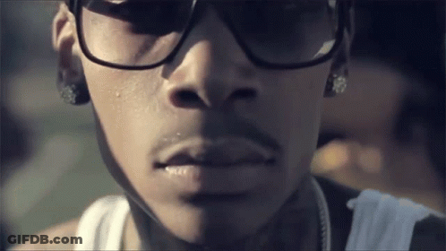 Close Up Man Face Wearing Sunglasses And Earrings GIF