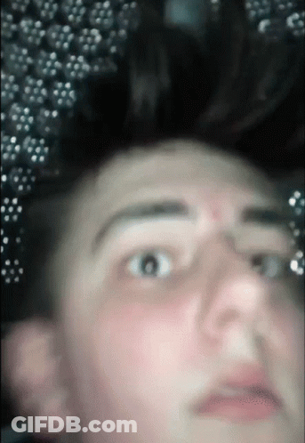 Close Up Man Face With Blurred Bubbles GIF