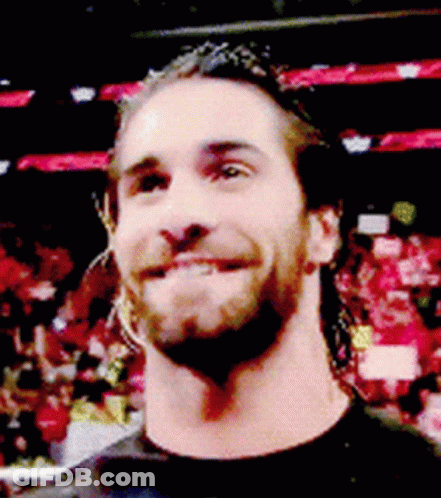 Close Up Man Face With Crowd GIF