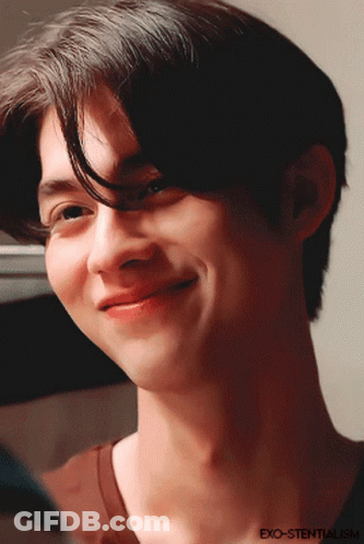 Close Up Man Face With Exo-Stentalism Written On Chest GIF
