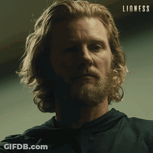 Close Up Man Face With Lioness Background GIF