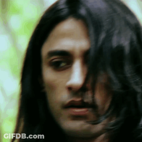 Close Up Man Face With Long Hair GIF