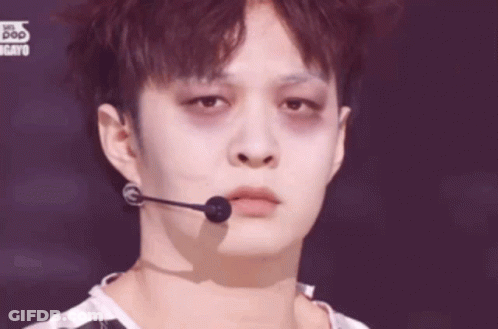 Close Up Man Face With Microphone Saying Pop GIF