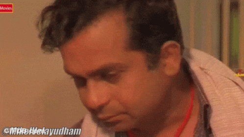 Close Up Man Face With @Mikelvelayudham Watermark GIF