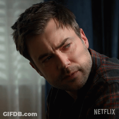 Close-Up Man Face With Netflix Logo GIF