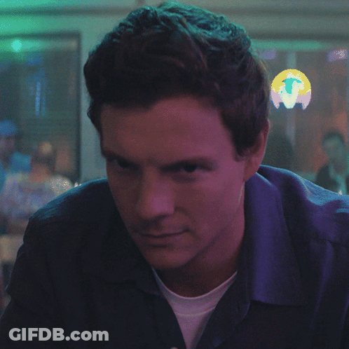 Close Up Man Face With Sign Saying T GIF