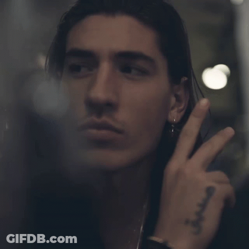 Close Up Man Face With Tattoo Saying A GIF