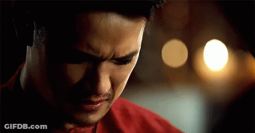 Close Up Man Face With Tear In Dark Room GIF