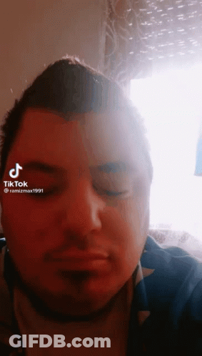 Close Up Man Face With TikTok Watermark GIF